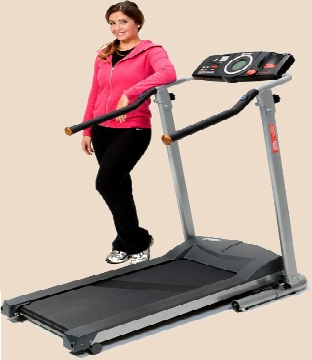 Woman standing beside a treadmill